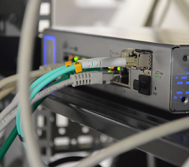 Business-grade network topology showing servers, routers, switches, and endpoint devices